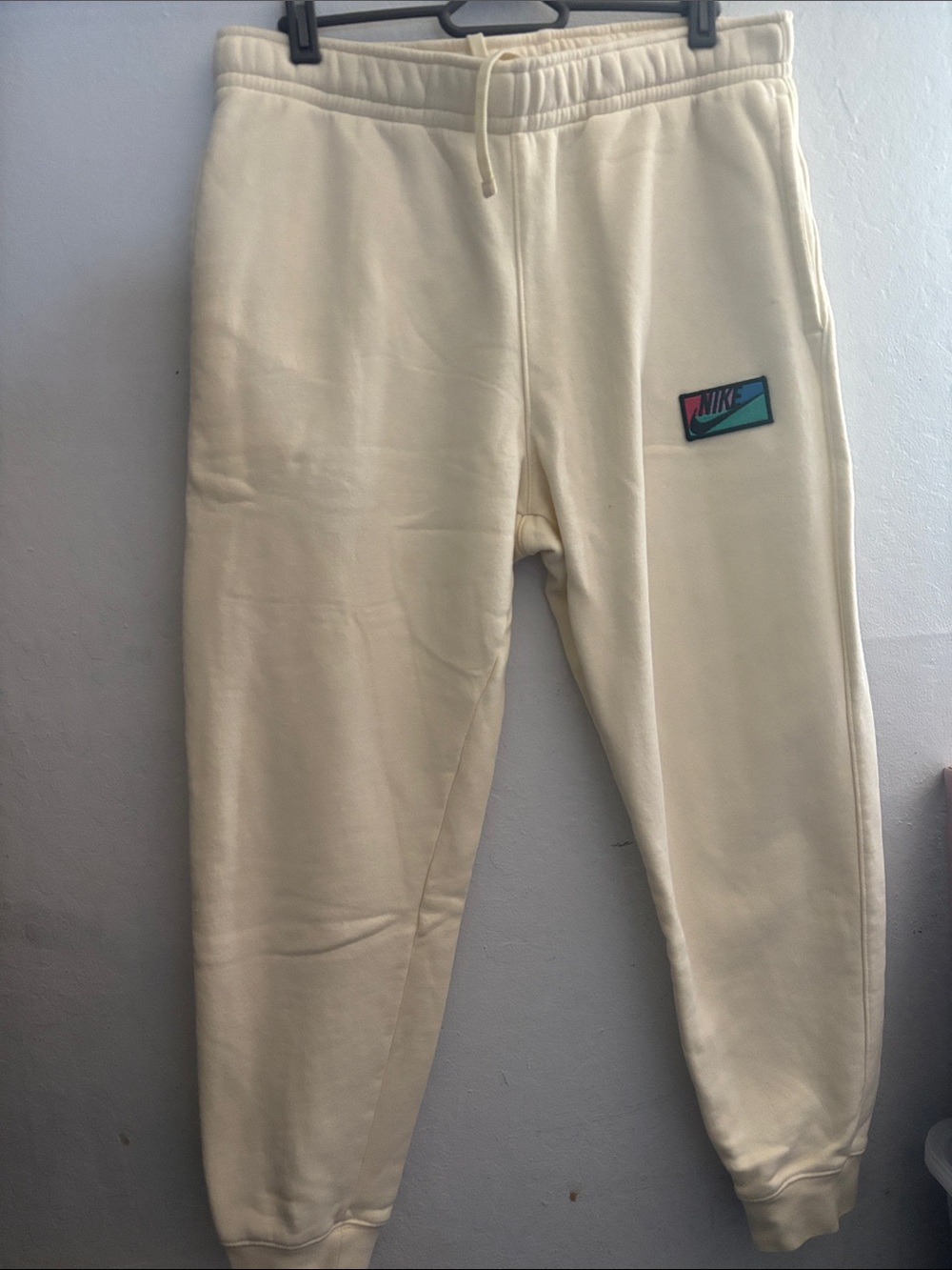 Nike Kids Cream Jogger Sweatpants with Teal & Pink Patch
